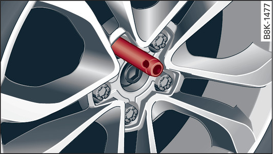 Fig. 318 Wheel: Mounting pin in wheel bolt hole nearest to the top